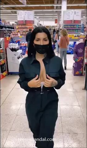 947. Latina flash tits in public store