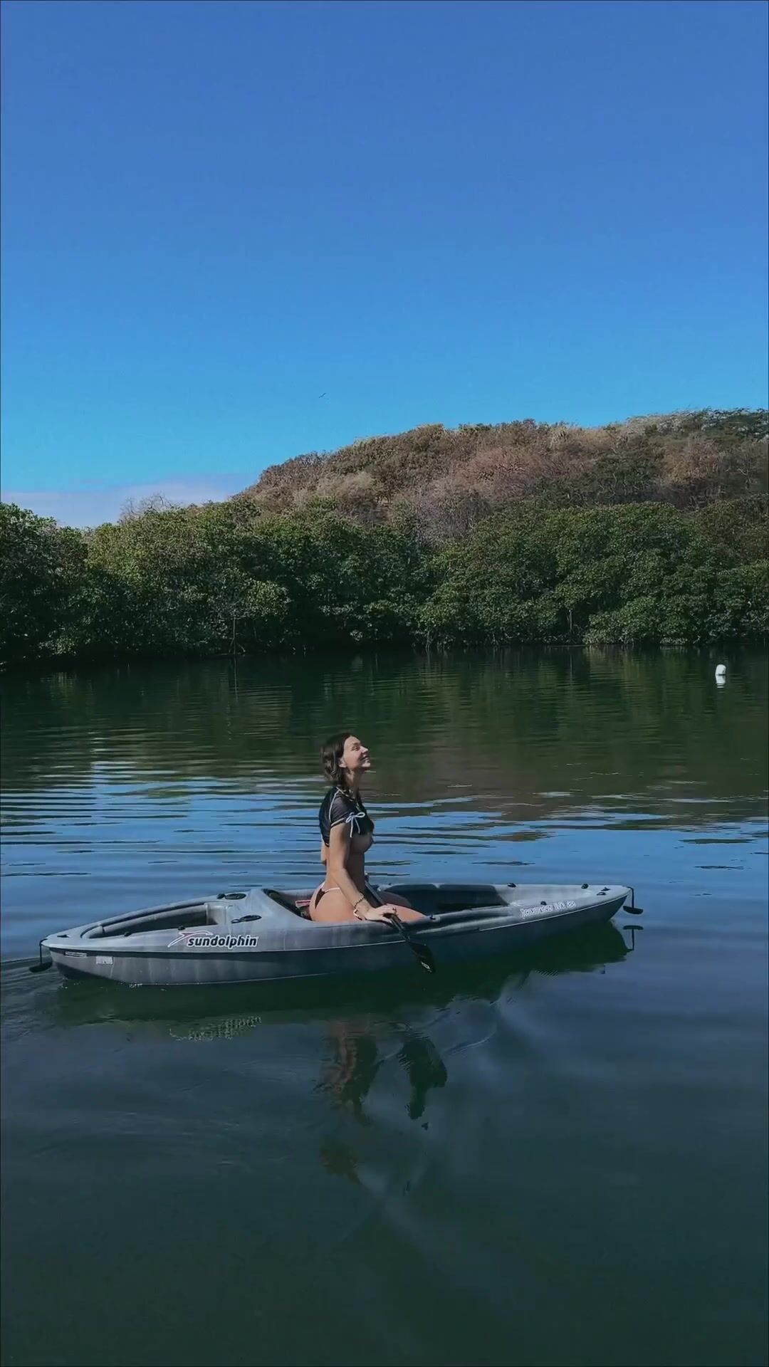 Rachel Cook topless canoeing
