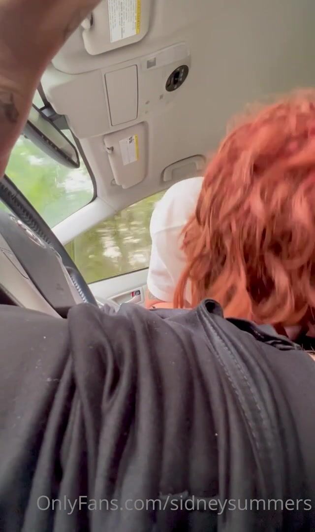 Sidneysummers redhead give a blowjob in the car